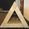 Složený sloup z dřevěných fošen s trojúhelníkovým příčným řezem