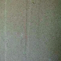 Obr. 2a – Vzhled patiny na nepřímo ovlhčovaných plochách – patina na stěně hlavního nosníku silničního mostu ve Frýdku-Místku